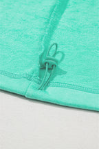 Parchment Solid Kangaroo Pocket Half Zipper Oversized Hoodie