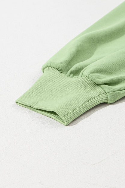 Parchment Solid Kangaroo Pocket Half Zipper Oversized Hoodie